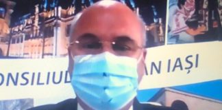 Popa si-a gaurit masca sa tina sedinta de CJ. Prin gaurica nu intra Covid Popa si-a gaurit masca Covid