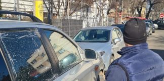 Bărbat și femeie din Iași bătuți golănește de fiul unui politician. Procurorii insistă să-l aresteze geamul masinii distrus de gloantele trase de Cristian Dobre si victima