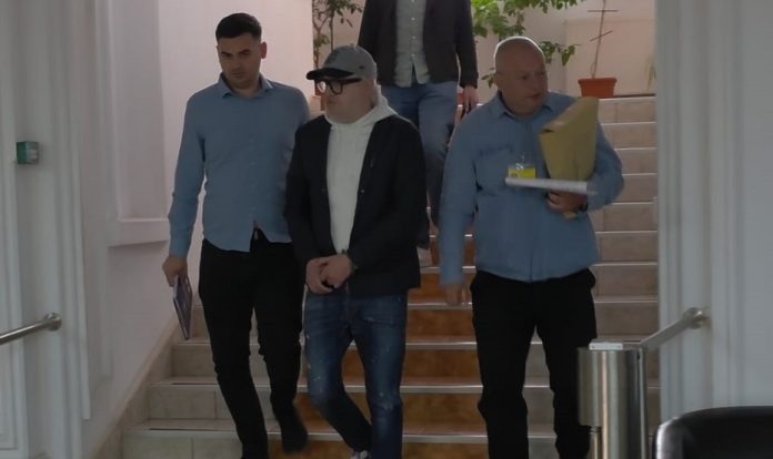 Manuel Onofrei în cătușe la sediul IPJ Iași